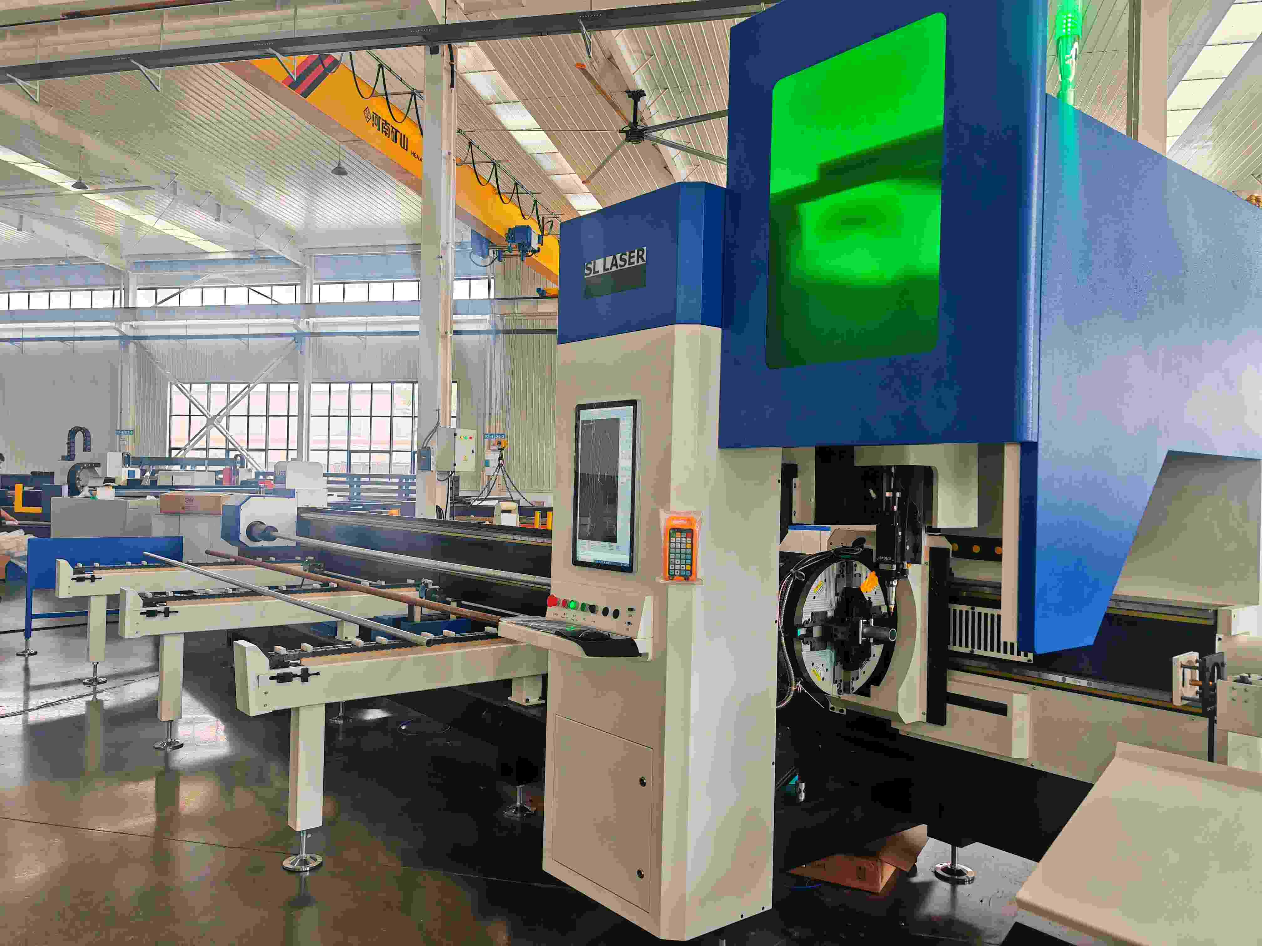 Round Pipe Cutting Fiber Laser Machine.jpg Round Pipe Cutting Fiber Laser Machine.jpg